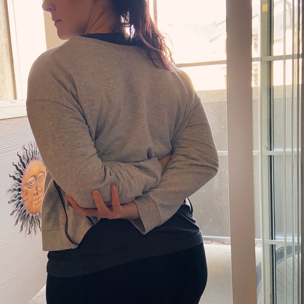 behind the back shoulder stretch to help with shoulder pain caused from hours of knitting and crocheting